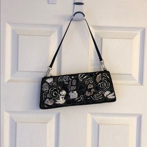 New York & Company black beaded clutch.